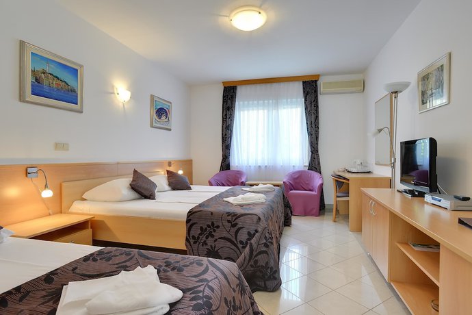 Imagen de la habitación del Hotel Zlatni rat Beach Resort. Foto 16