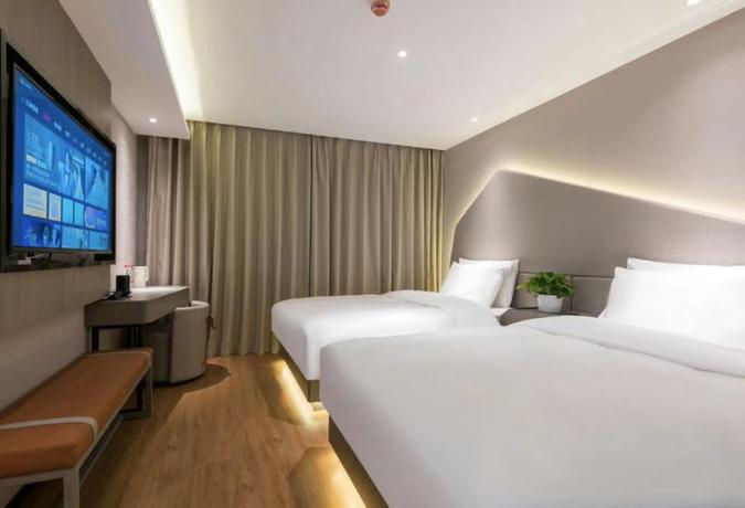 Imagen de la habitación del Hotel Zmax Hotel&middot;Beijing Jiuxianqiao Lido Xingji Bear. Foto 9