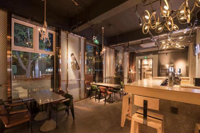 Imagen del bar/restaurante del Hotel Zmax Hotel&middot;Beijing Jiuxianqiao Lido Xingji Bear. Foto 3