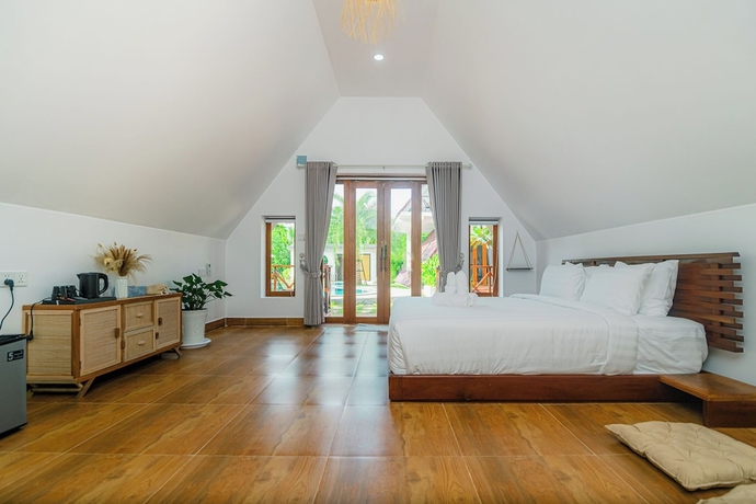 Imagen de la habitación del Hotel Zodiac Bungalows. Foto 3