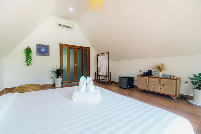 Imagen de la habitación del Hotel Zodiac Bungalows. Foto 4