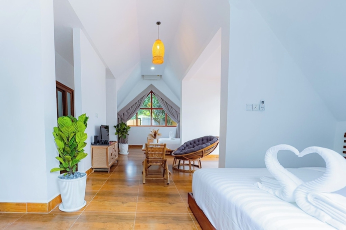Imagen de la habitación del Hotel Zodiac Bungalows. Foto 5