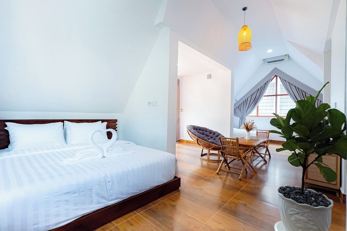 Imagen de la habitación del Hotel Zodiac Bungalows. Foto 6