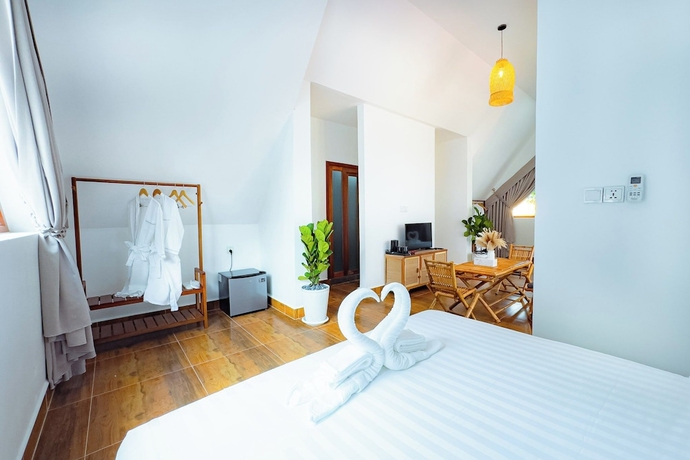 Imagen de la habitación del Hotel Zodiac Bungalows. Foto 8