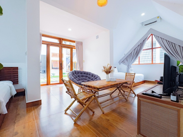 Imagen de la habitación del Hotel Zodiac Bungalows. Foto 10