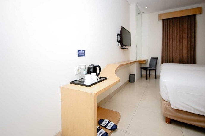 Imagen de la habitación del Hotel Zodiak Asia Afrika By Kagum Hotels. Foto 7