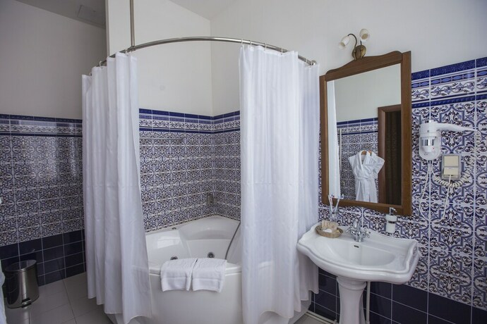 Imagen de la habitación del Hotel Zodiak Boutique. Foto 30