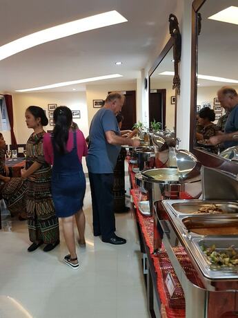 Imagen del bar/restaurante del Hotel Zoe S Paradise Waterfront Hotel. Foto 3