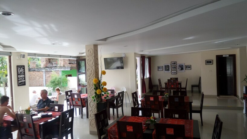 Imagen del bar/restaurante del Hotel Zoe S Paradise Waterfront Hotel. Foto 4
