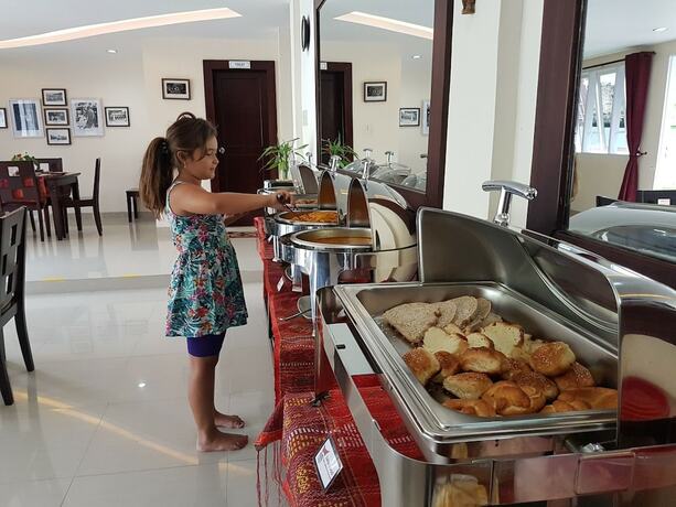 Imagen del bar/restaurante del Hotel Zoe S Paradise Waterfront Hotel. Foto 8