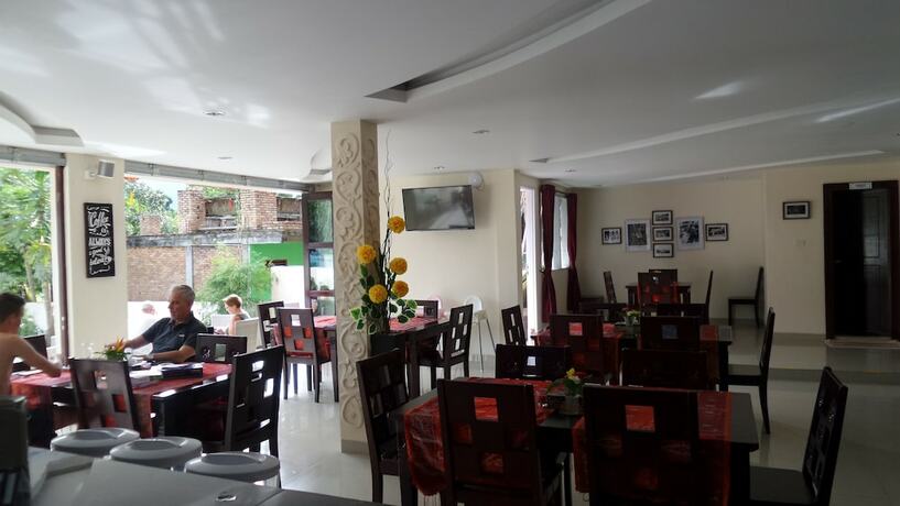 Imagen del bar/restaurante del Hotel Zoe S Paradise Waterfront Hotel. Foto 9