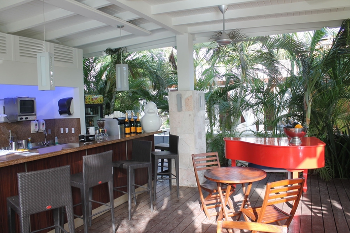 Imagen del bar/restaurante del Hotel Zoetry Curaçao Resort and Spa. Foto 3