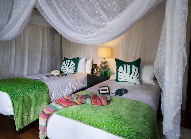 Imagen de la habitación del Hotel Zoetry Marigot Bay. Foto 13