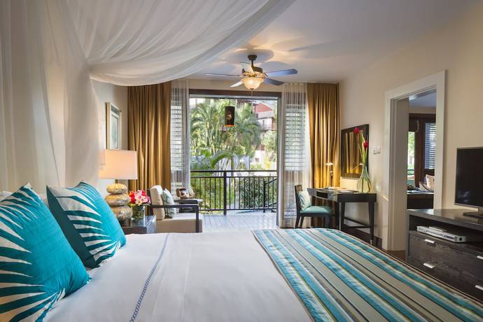 Imagen de la habitación del Hotel Zoetry Marigot Bay. Foto 17