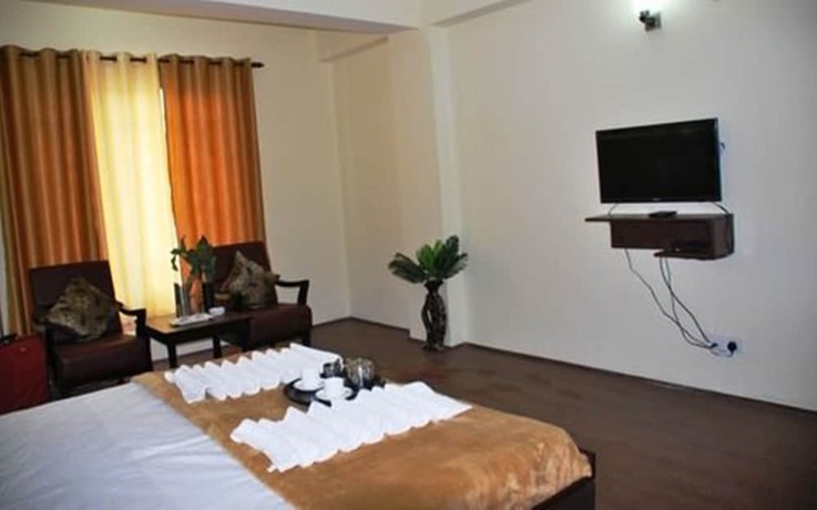 Imagen de la habitación del Hotel Zojila Residency. Foto 12