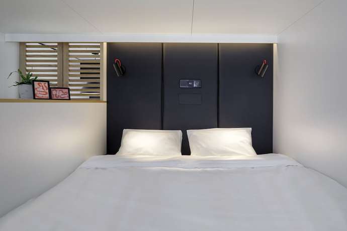 Imagen de la habitación del Hotel Zoku Copenhagen. Foto 4