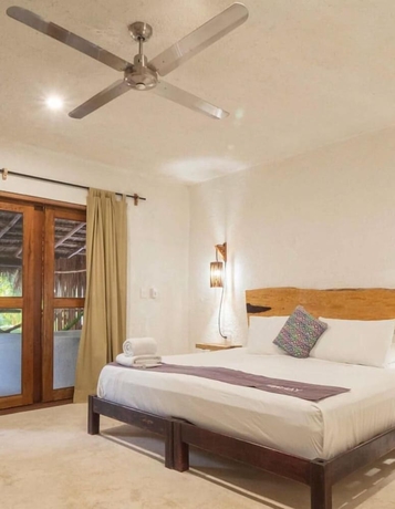 Imagen de la habitación del Hotel Zomay Beachfront Holbox. Foto 1