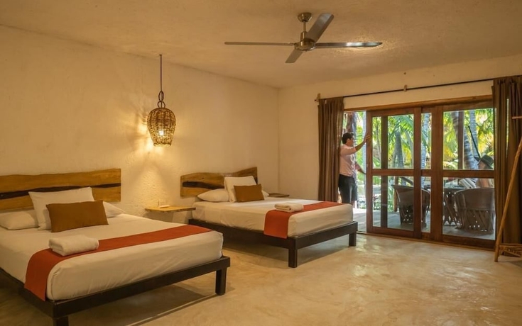 Imagen de la habitación del Hotel Zomay Beachfront Holbox. Foto 6