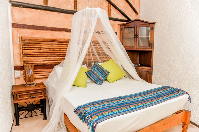 Imagen de la habitación del Hotel Zomay Beachfront Holbox. Foto 12