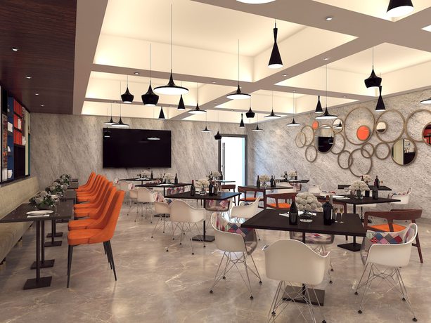 Imagen de los interiores del Hotel Zone By The Park Pathankot. Foto 8