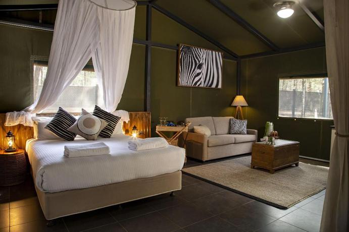 Imagen de la habitación del Hotel Zoofari Lodge. Foto 8