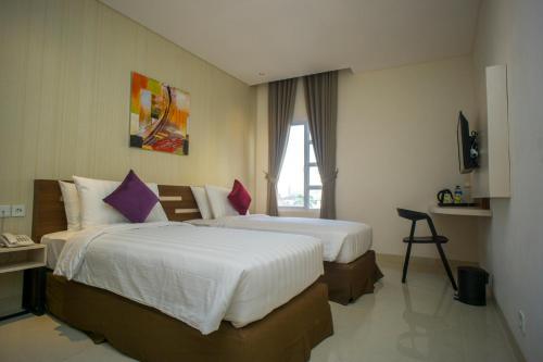 Imagen de la habitación del Hotel Zoom Hotel Mulawarman. Foto 7