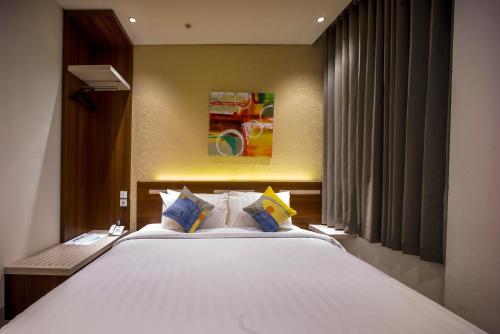 Imagen de la habitación del Hotel Zoom Hotel Mulawarman. Foto 8