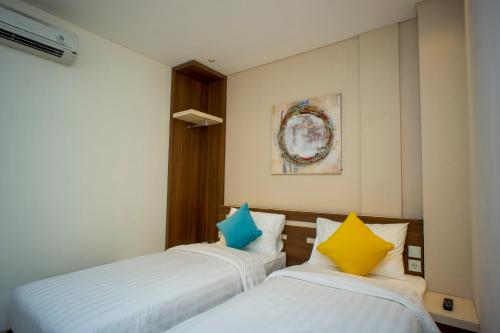 Imagen de la habitación del Hotel Zoom Hotel Mulawarman. Foto 9