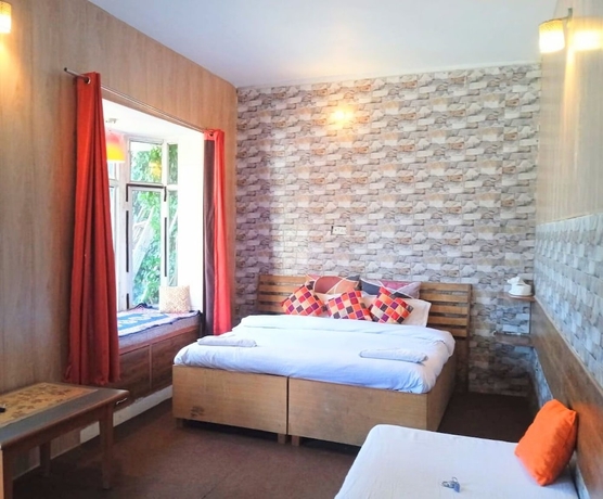 Imagen de la habitación del Hotel Zostel Mukteshwar. Foto 13