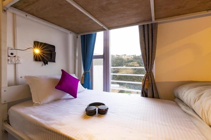 Imagen de la habitación del Hotel Zostel Mukteshwar. Foto 18