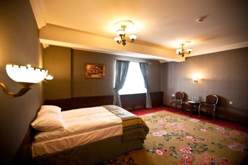 Imagen de la habitación del Hotel Złoty Młyn Majk&oacute;w. Foto 8