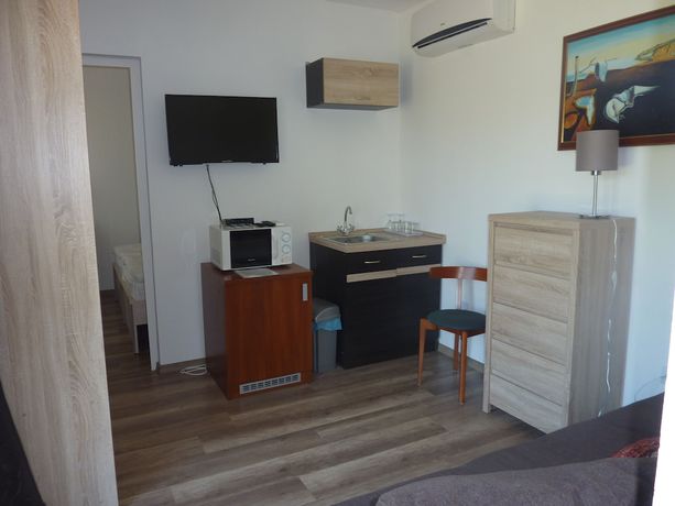 Imagen de la habitación del Hotel Zsanett. Foto 13