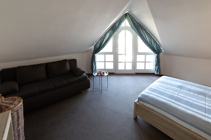 Imagen de la habitación del Hotel Zsanett. Foto 19