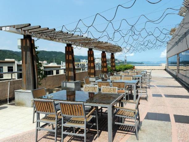 Imagen del bar/restaurante del Hotel Zte Da Mei Sha. Foto 2