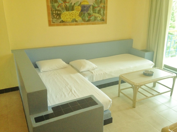 Imagen de la habitación del Hotel Zuana Beach Resort. Foto 11