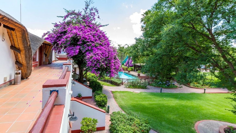 Imagen de la piscina del Hotel Zulu Nyala Country Manor. Foto 14