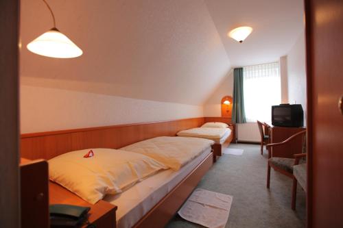 Imagen de la habitación del Hotel Zum Alten Brauhaus, Hofgeismar. Foto 6