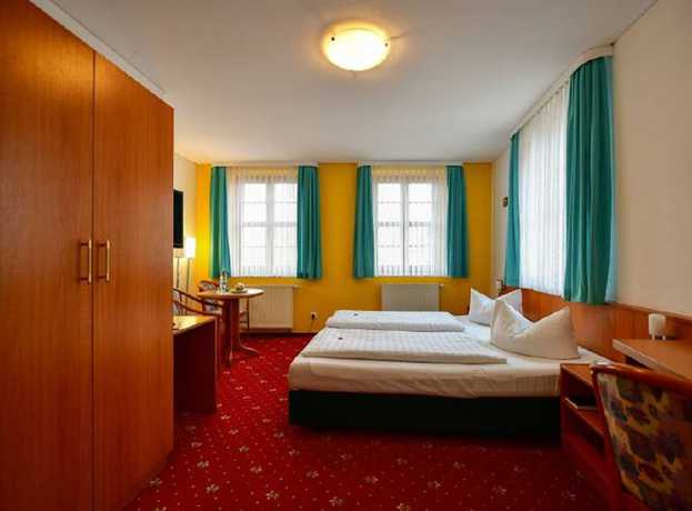 Imagen de la habitación del Hotel Zum Goldenen L&ouml;wen, Cottbus. Foto 8