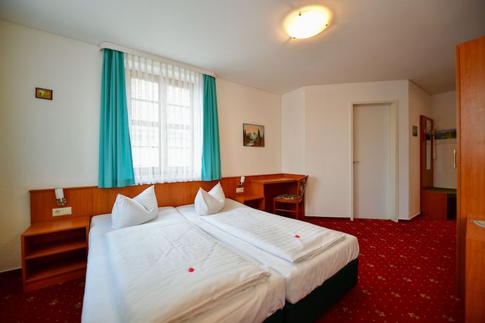 Imagen de la habitación del Hotel Zum Goldenen L&ouml;wen, Cottbus. Foto 9