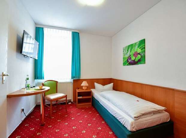 Imagen de la habitación del Hotel Zum Goldenen L&ouml;wen, Cottbus. Foto 11