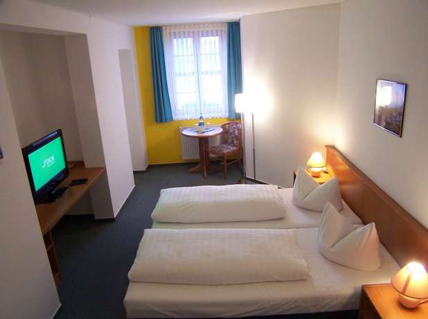 Imagen de la habitación del Hotel Zum Goldenen L&ouml;wen, Cottbus. Foto 12
