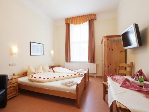 Imagen de la habitación del Hotel Zum Herrenhaus. Foto 9