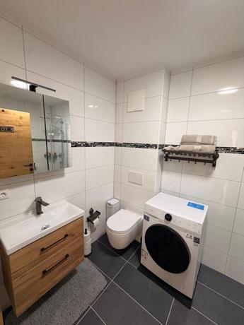 Imagen de la habitación del Hotel Zum L&ouml;wen Apartments. Foto 4