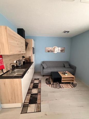 Imagen de la habitación del Hotel Zum L&ouml;wen Apartments. Foto 5