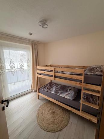 Imagen de la habitación del Hotel Zum L&ouml;wen Apartments. Foto 8