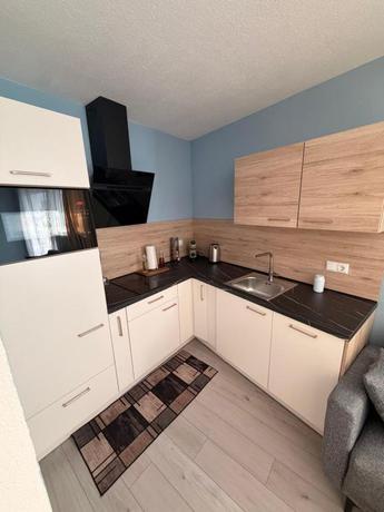 Imagen de la habitación del Hotel Zum L&ouml;wen Apartments. Foto 10