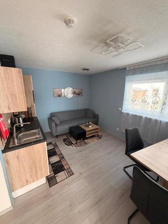 Imagen de la habitación del Hotel Zum L&ouml;wen Apartments. Foto 12