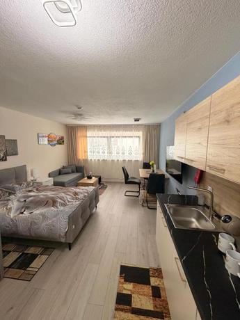 Imagen de la habitación del Hotel Zum L&ouml;wen Apartments. Foto 16
