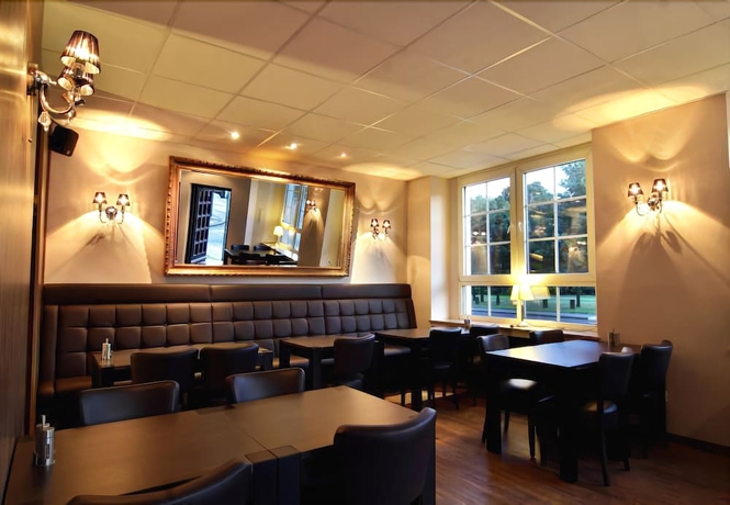 Imagen del bar/restaurante del Hotel Zum L&ouml;wen, Duisburgo. Foto 5