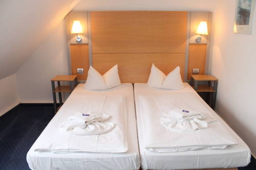 Imagen de la habitación del Hotel Zum Strand. Foto 2